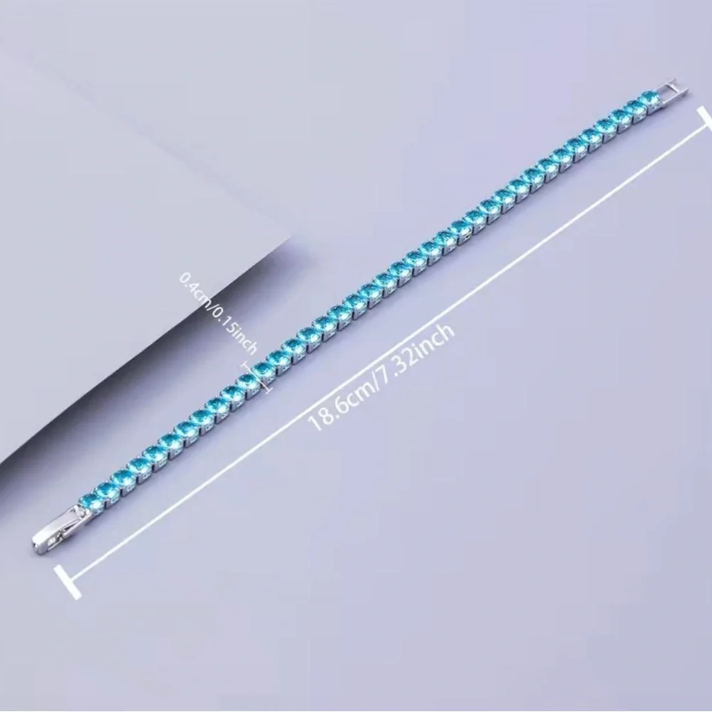 Beautiful Round Blue Topaz Bracelet In White Gold - Picture 11 of 12